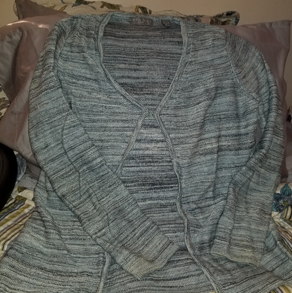Sweater/cardigan  with one hook to close.